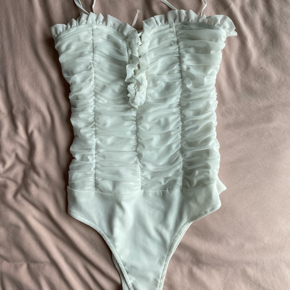Ruffled body suit